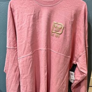Pink and rose gold new with tags Disney world spirit jersey